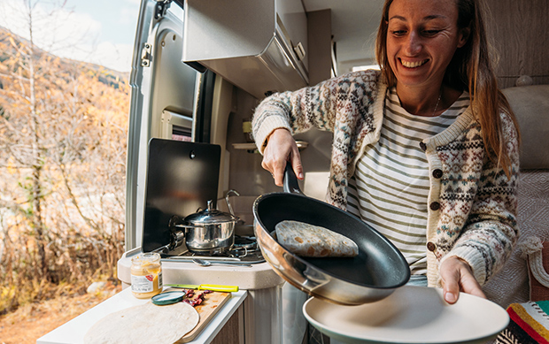 image-3 Preparing a meal in your gallery is easy. She is happy with living in her RAM van conversion