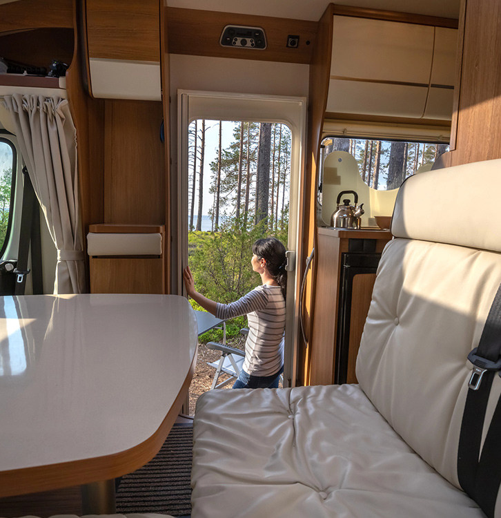 image-9 Looking outside while thinking about being able to travel in your home away from home. Cozy Condos can help you convert your van